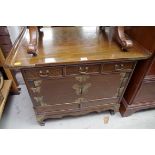 A Chinese or Korean elm low side cabinet, 73.5cm wide.