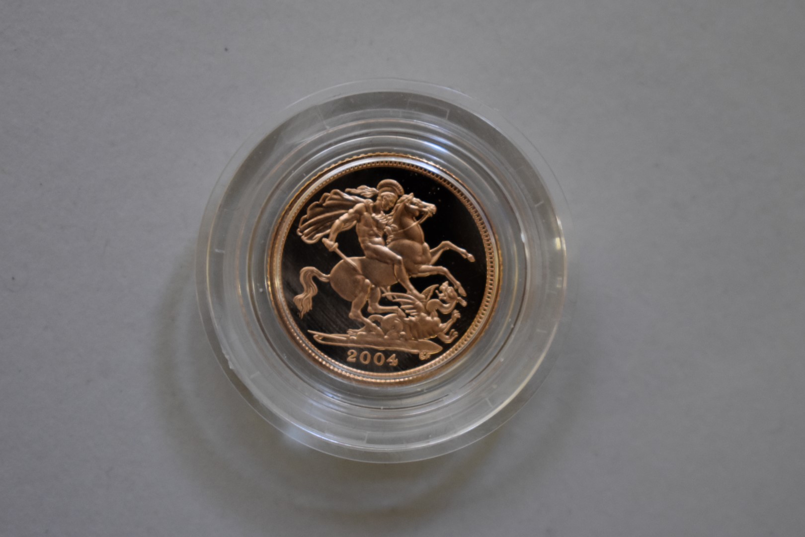 An Elizabeth II 2004 gold proof half sovereign, boxed. - Image 2 of 3