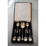 A cased silver dessert spoon set, by R F Mosley & Co, Sheffield 1942, 207.5g.