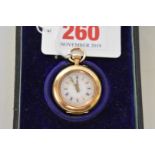 A cased Continental gold stem wind fob watch, stamped 14k, having coloured enamel back decorated