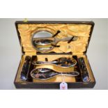 A cased silver and tortoiseshell five piece dressing table set, by Henry Matthews, Birmingham 1922/