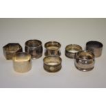 Eight silver napkin rings, 221.5g.