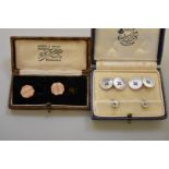 A cased set of mother of pearl gold cufflinks and studs, 7.3g total weight; together with a cased