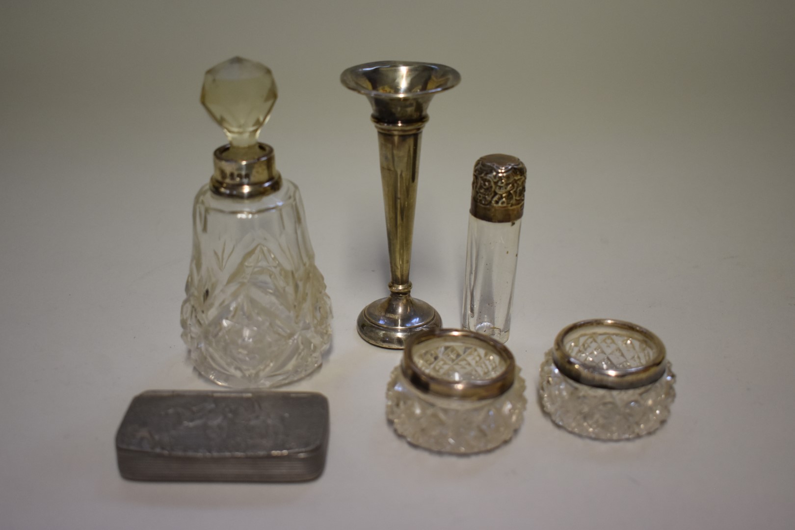 A small group of silver and silver mounted items; together with a metal snuff box. (6)