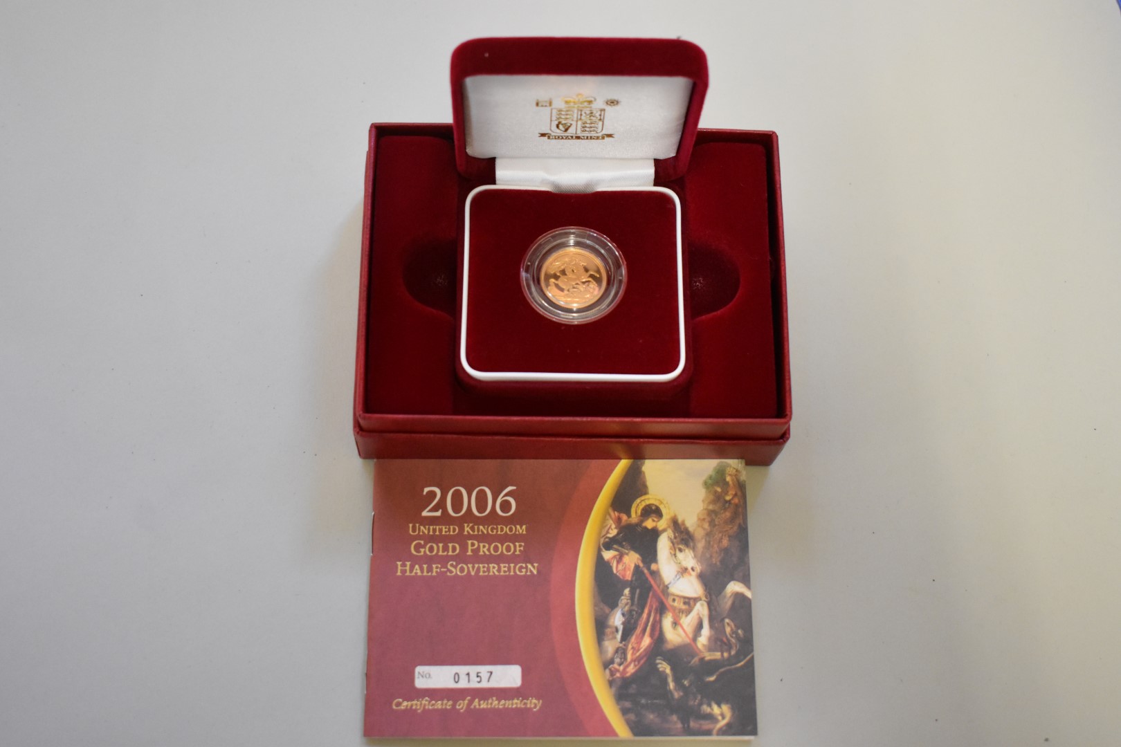 An Elizabeth II 2006 gold proof half sovereign, boxed.