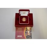 An Elizabeth II 2006 gold proof half sovereign, boxed.