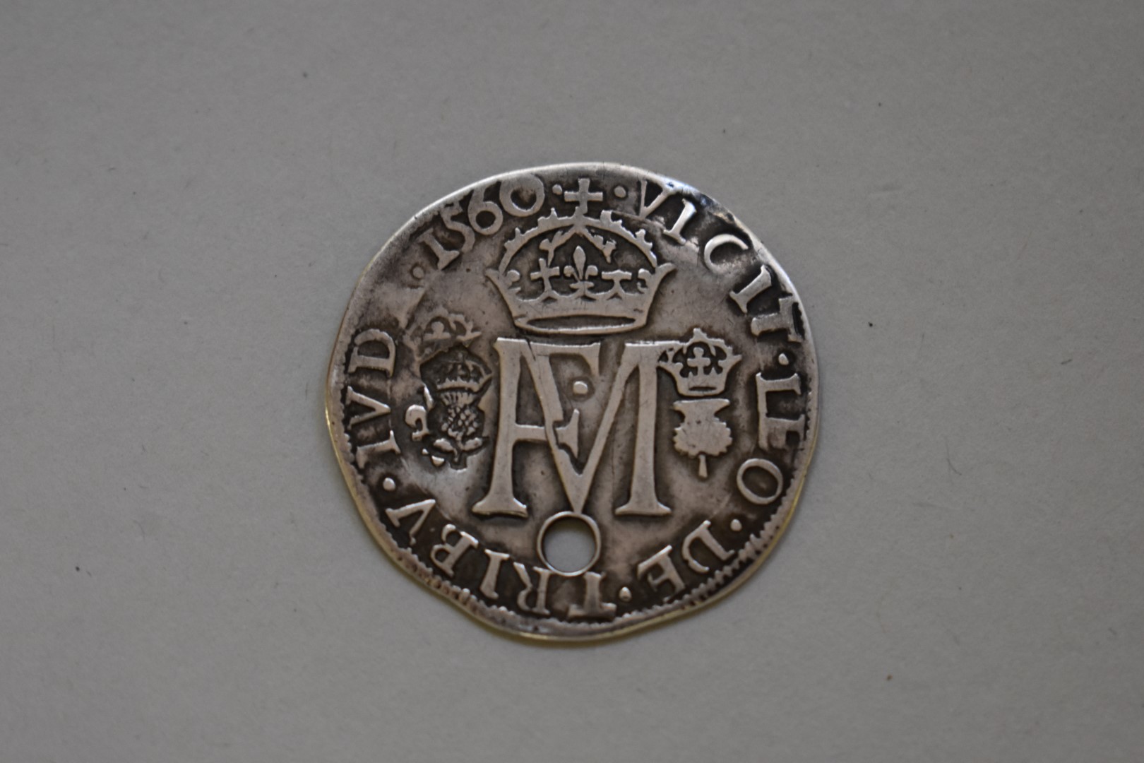 Coins: a Scottish Francis and Mary 1560 silver testoon, 30mm, 5.6g.