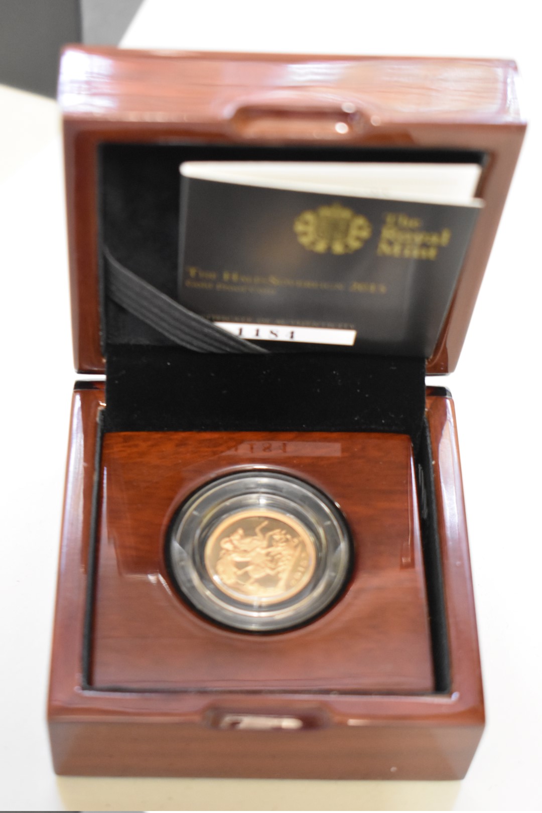 An Elizabeth II 2015 gold proof half sovereign, boxed.