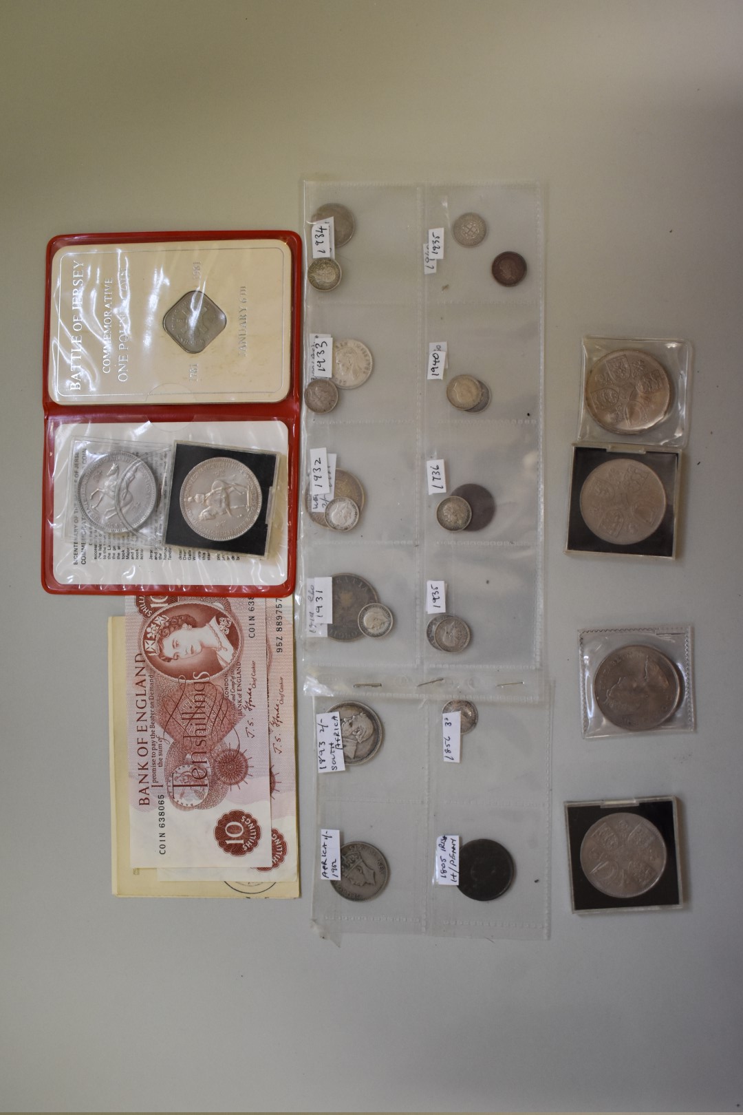 Coins: a quantity of UK and world coinage, to include some silver examples; together with two