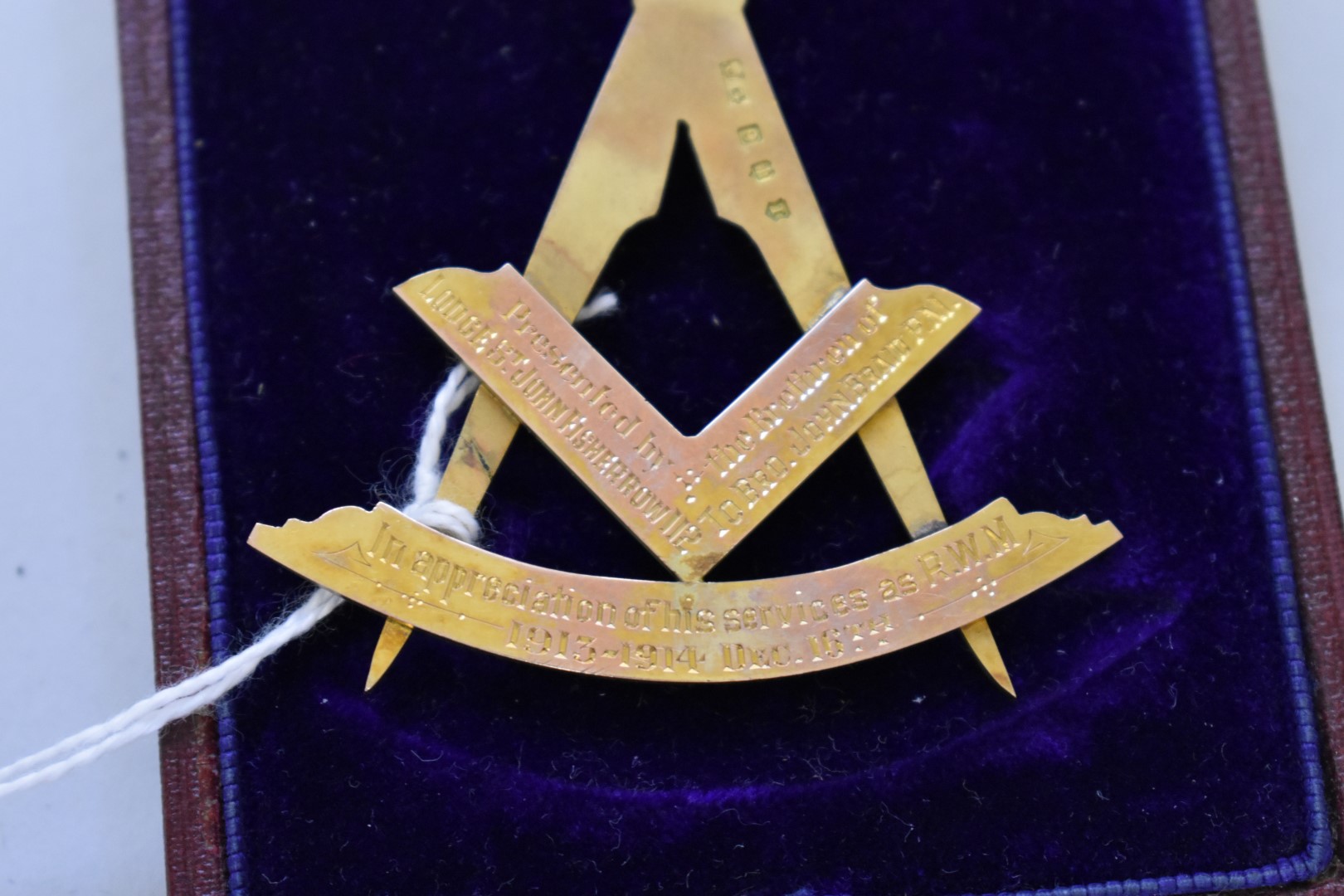 A cased gold and enamel Masonic medal, hallmarked 9ct in places, for the St. John Lodge, Fisher - Image 3 of 3