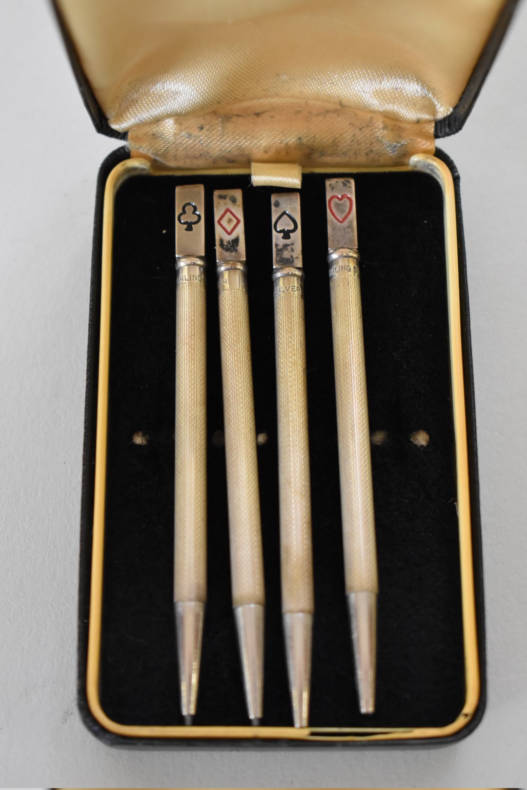 A cased set of four sterling silver engine turned bridge pencils. - Image 2 of 3