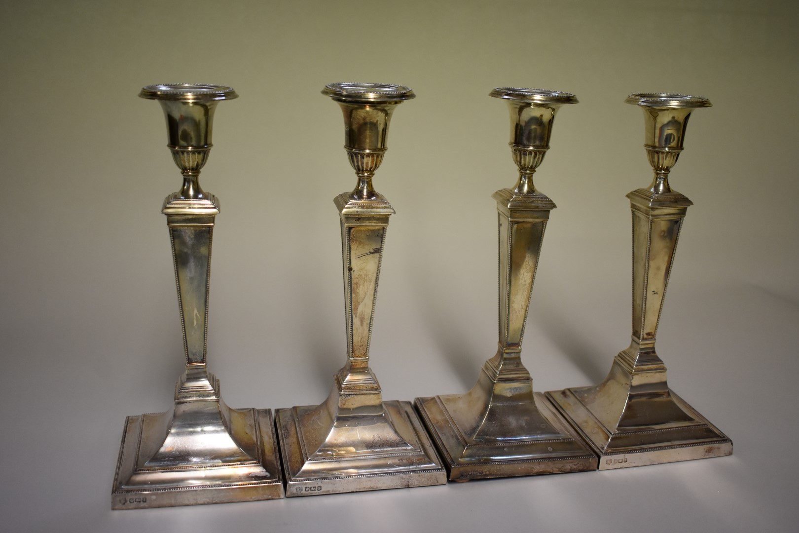 A set of four Edwardian silver candlesticks, by Hawsworth, Eyre & Co Ltd, Sheffield 1910/11, 25. - Image 3 of 4