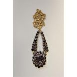 A Bohemian garnet set unmarked necklace, the clasp stamped 333, 12.5g total weight.