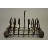 A George III silver six section toast rack, by Henry Wilkinson & Co, Sheffield 1794, 18cm long,