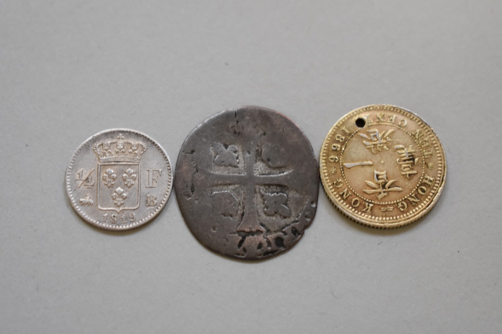 Coins: a French Louis XVIII 1819 silver quarter franc, 15mm, 1.4g; together with an ancient - Image 2 of 2