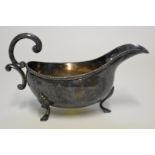 A silver sauce boat, by D Bros, Birmingham 1963, 10cm high, 192g.