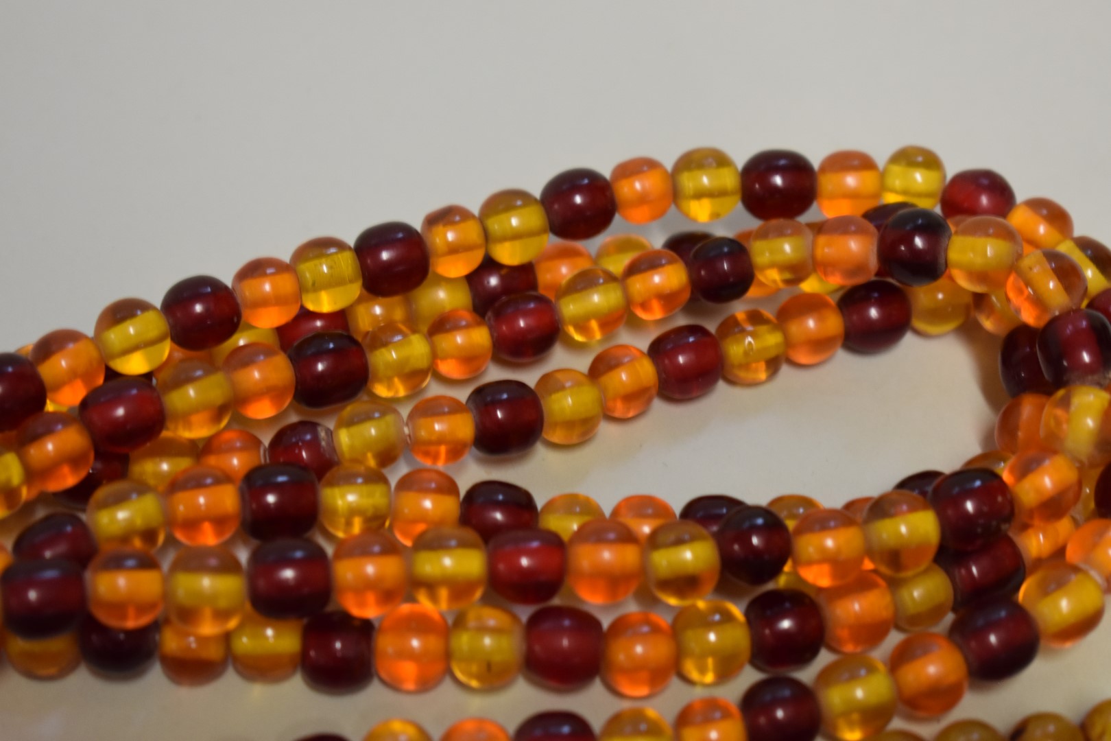 Three strings of amber coloured beads. - Image 2 of 3