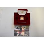 An Elizabeth II 2007 gold proof half sovereign, boxed.