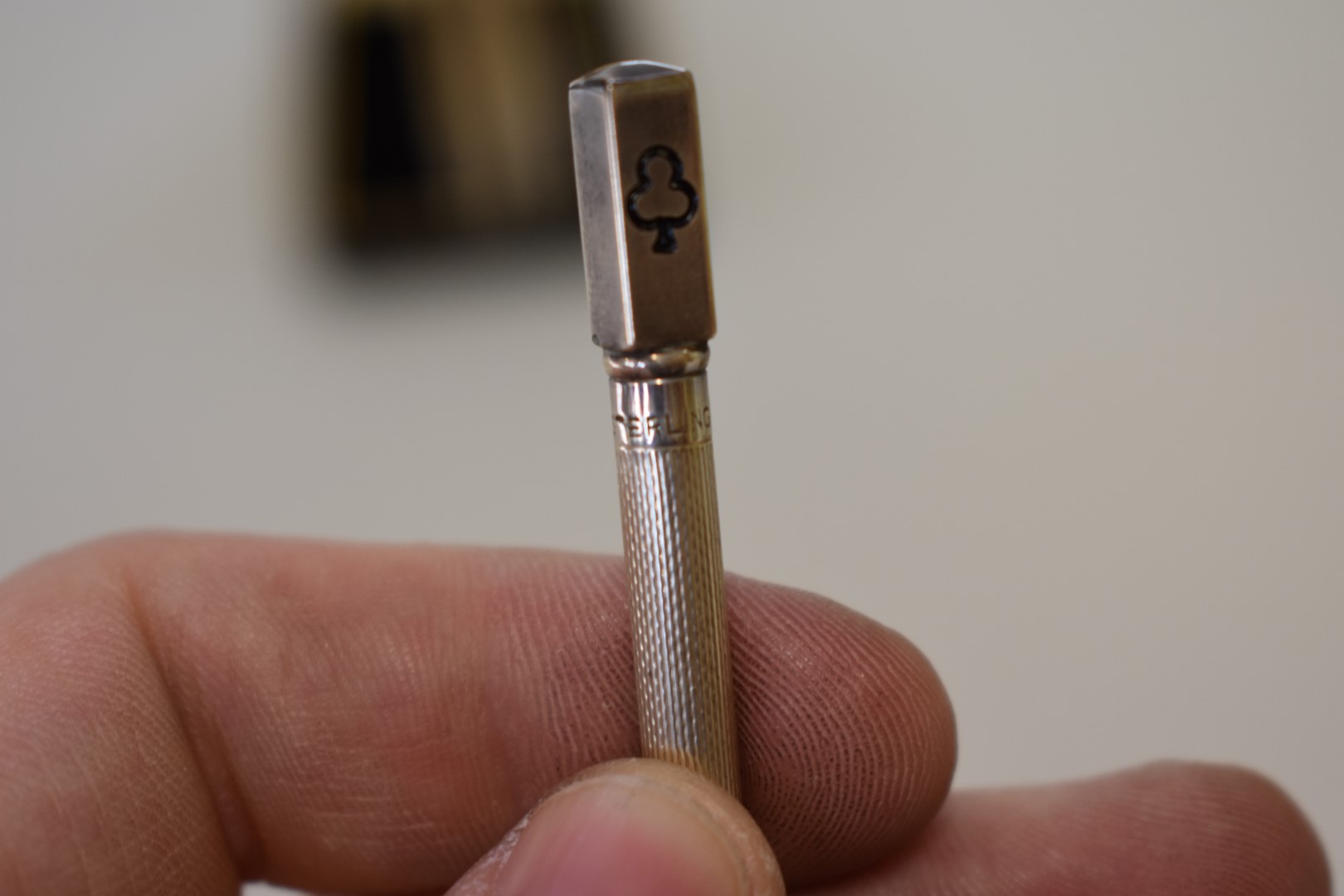 A cased set of four sterling silver engine turned bridge pencils. - Image 3 of 3