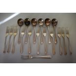 A set of twelve silver Old English rat tail pattern forks; together with six matching soup spoons,