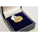 A diamond gold ring, stamped 18ct, set six diamonds of approximately 0.7ct.