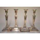 A set of four Edwardian silver candlesticks, by Hawsworth, Eyre & Co Ltd, Sheffield 1910/11, 25.