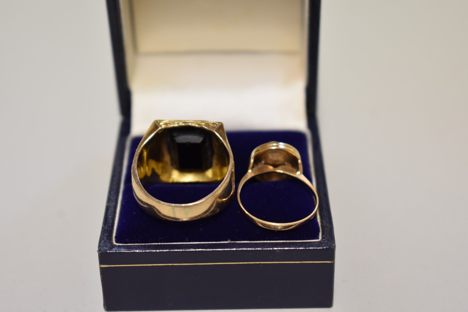 An onyx unmarked yellow metal gentleman's ring; together with an unmarked yellow metal pearl ring, - Image 3 of 3