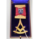 A cased gold and enamel Masonic medal, hallmarked 9ct in places, for the St. John Lodge, Fisher