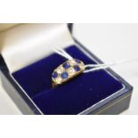 A sapphire and diamond gold ring, hallmarked 18ct, 4.2g total weight, (shank cut).