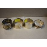 Four various silver napkin rings, 71g.