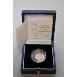 An Elizabeth II 1999 gold proof half sovereign, boxed.