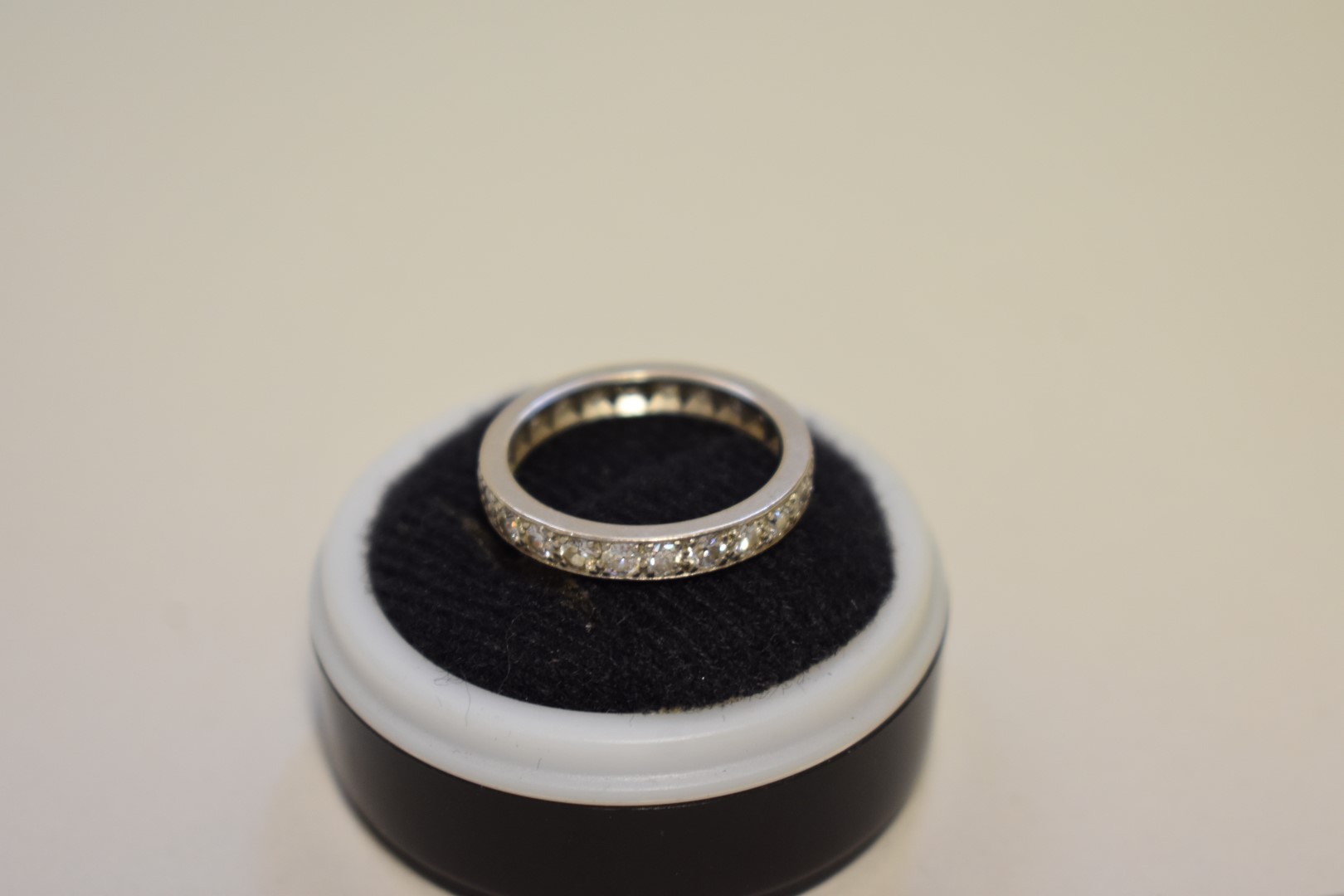 A diamond set unmarked white metal eternity ring, 4.2g total weight. - Image 2 of 3