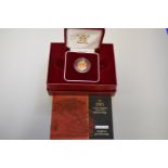 An Elizabeth II 2001 gold proof half sovereign, boxed.