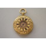A Swiss chased gold half hunter key wind fob watch, stamped 18k, the movement marked Motte Geneve,