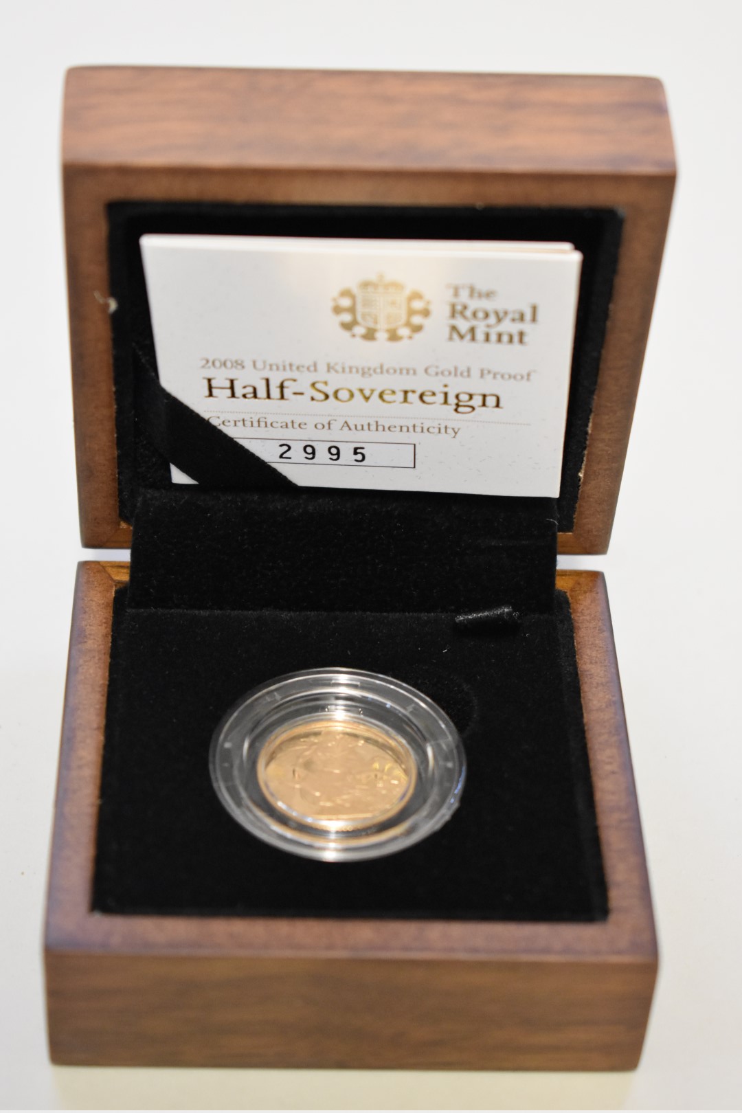 An Elizabeth II 2008 gold proof half sovereign, boxed.