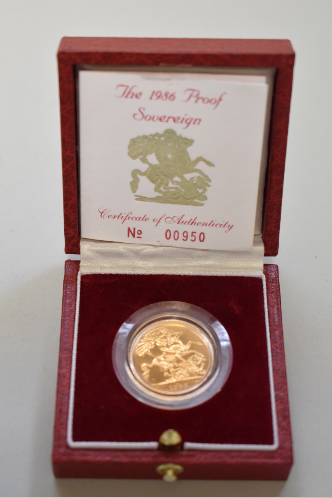 An Elizabeth II 1986 gold proof sovereign, boxed.