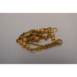 A fancy link gold necklet, the clasp stamped 9ct, 33cm long, 4.6g.