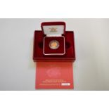 An Elizabeth II 2005 gold proof half sovereign, boxed.