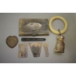 Four decorative silver page markers; together with three other unmarked items. (7)