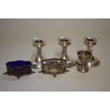 Three silver squat candlesticks; together with three other silver items.