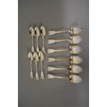A set of six George III silver fiddle pattern dessert spoons, by Benjamin Davis, London 1825;