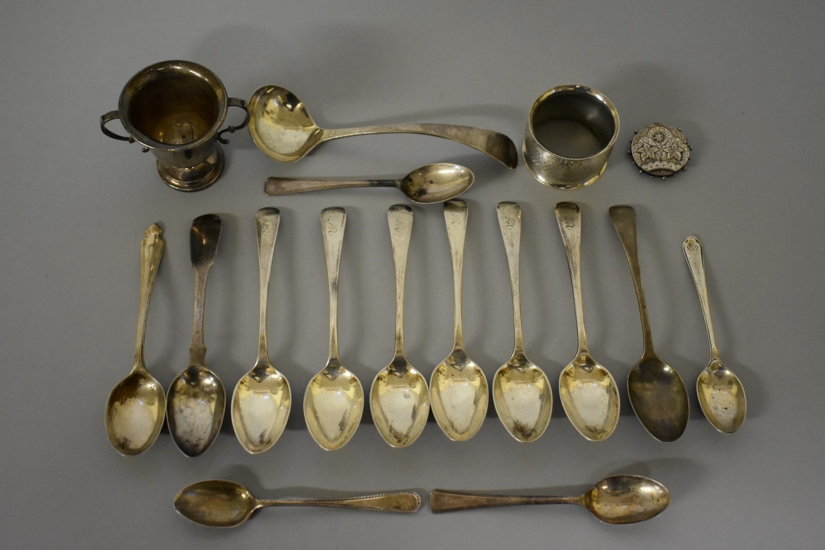 A set of six Edwardian silver teaspoons, by John Round, Sheffield 1911; together with various