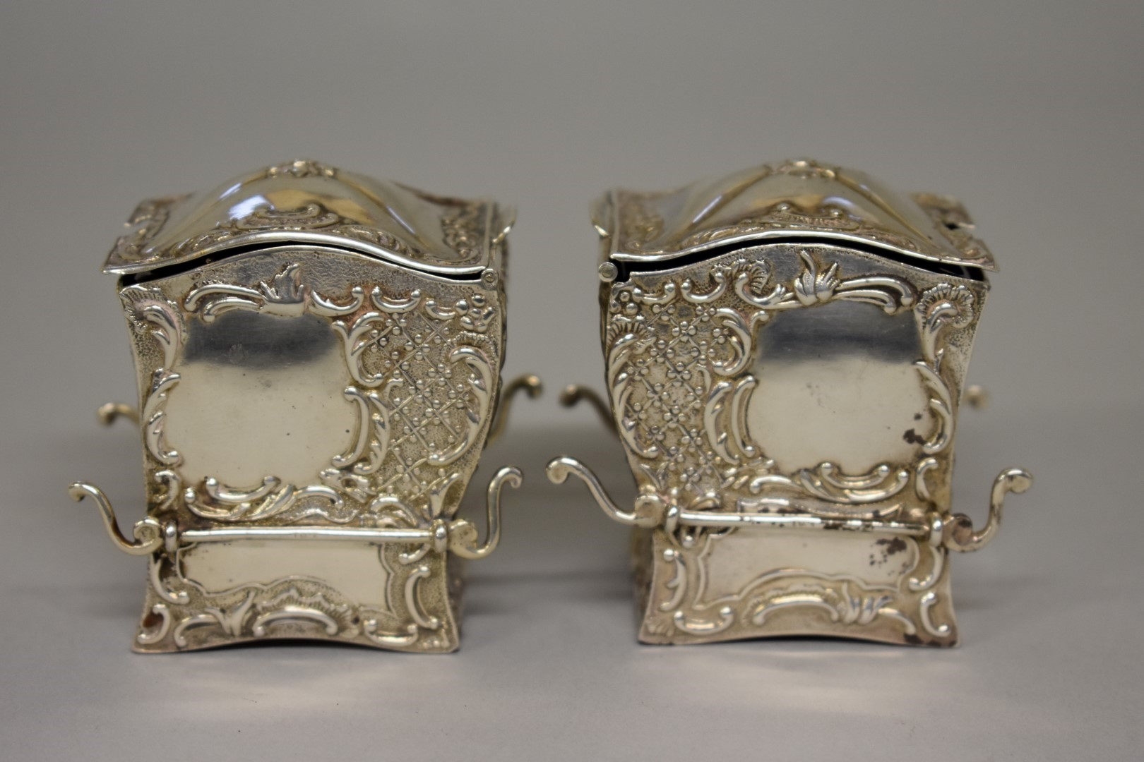 A pair of Edwardian silver novelty 'Sedan Chair' salts, by Samuel Jacob, London 1907, 5.5cm high,