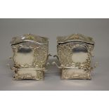 A pair of Edwardian silver novelty 'Sedan Chair' salts, by Samuel Jacob, London 1907, 5.5cm high,