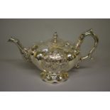 A William IV silver teapot, by John Wellby, London 1836, 14cm high, 572g all in.