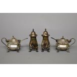 A pair of silver pepperettes, by Henry Clifford Davis, Birmingham 1935; together with a pair of