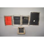Three silver rectangular photograph frames, by Arthur Price and two others. (5)