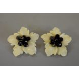 A pair of designer resin and crystal floral ladies cufflinks, by Anne Fontaine, 5cm diameter.