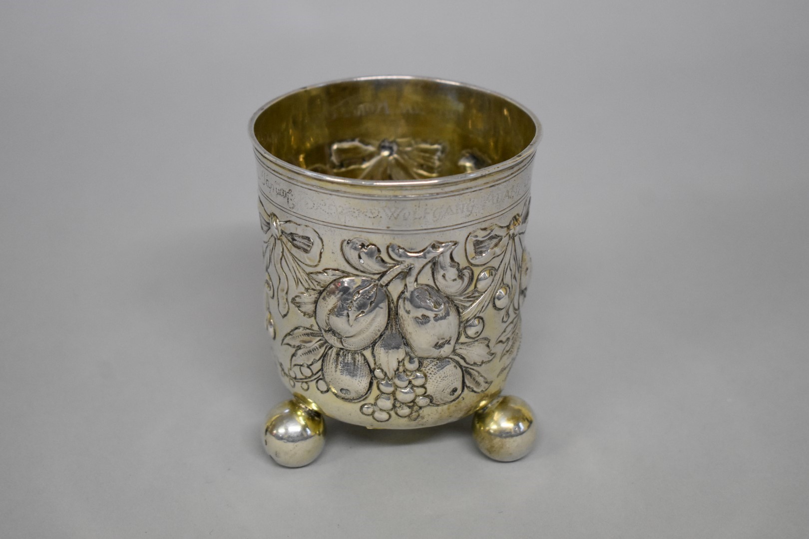 An antique Continental white metal beaker, having floral fruit and ribbon chased decoration, - Image 2 of 4
