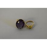 An amethyst gold ring; together with another gem set example, both hallmarked/stamped 9ct, 13.7g